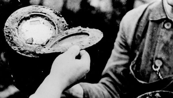 Black and white photography with hand and plate